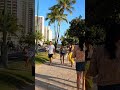 walking with tourists on the street in waikiki hawaii ☀️ 🤙