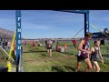 see division 2 all state boys cross the finish line at 2024 mhsaa l.p. cross country finals