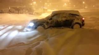 Audi A3 quattro pulling snow