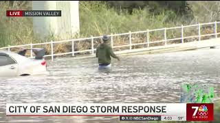 Man casually exits car after driving into flooded area of San Diego during live shot | NBC San Diego