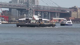 NYC's Concorde supersonic jet takes barge ride back to museum after restoration in Brooklyn