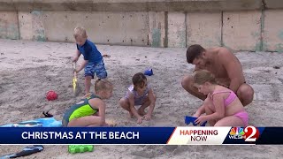 Families celebrate Christmas on the beach in Central Florida