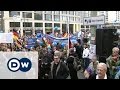 Thousands protest against asylum policy | DW News