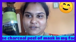 Oshea bamboo charcoal peel of mask on my face ...its really good to work.