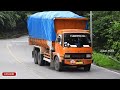 great truck mitsubishi fuso orange loaded and tall on the sitinjau lauik amazing truck fuso orange