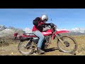 a 1978 suzuki 370 sp breathing fresh air in the mountains and bare foot kick starting