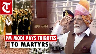 PM Modi pays tributes to martyrs at National War Memorial