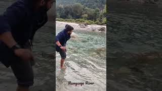 Throwing pebbles in ramganga river