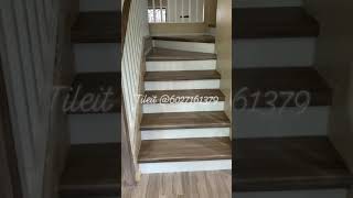 Porcelain flooring stairs are made to look like the 8x48 porcelain planks