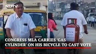 Gujarat Polls: Congress MLA Carries 'Gas Cylinder' On His Bicycle To Cast Vote