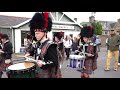 blairgowrie rattray u0026 district pipe band marching to the 2019 braemar gathering in scotland