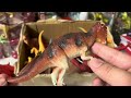 dinosaur figures in box jurassic world blue tyrannosaurus triceratops amargasaurus orolotitan.