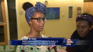 High school students rally for change to school dress code on headwraps