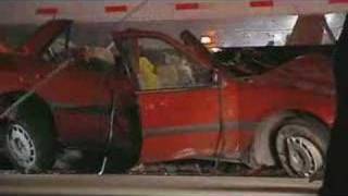 Couple Escapes When Car Slides Under Semi