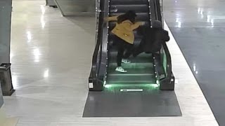 A rapid rescue: security officer saves elderly woman on escalator