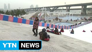 겨울엔 이 맛이지! 도심 속에서 눈썰매 '씽씽' / YTN