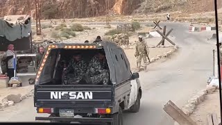 Taking a bus with armed convoy from Dahab to Cairo in Egypt. Going through Sinai peninsula and Suez.