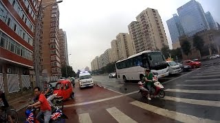 Ambulance responding , blocked by Tricycle//救护车被三轮车阻挡