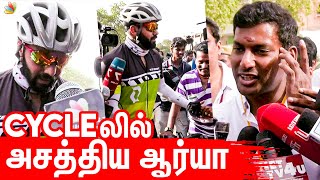 சைக்கிளில் வந்து அசத்திய ஆர்யா  | Arya cycles to cast his VOTE for Nadigar Sangam Elections 2019