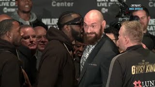 FACE-OFF! Deontay Wilder and Tyson Fury push each other and thrown off stage