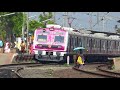 southern railways pink face medha emu train on a curvy platform indian railways