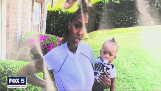 Mother shot and killed in apartment with child nearby