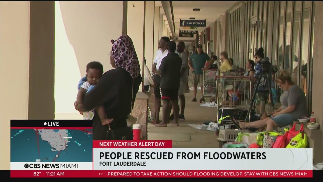 People Rescued From Homes Surrounded By Flood Waters Brought To Staging ...