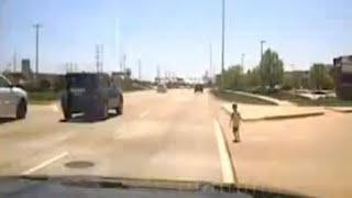 Illinois police officer rushes to little boy's rescue on busy highway