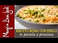 Risotto rosso con i piselli in pentola a pressione