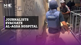 Journalists evacuate Al-Aqsa hospital following Israeli threat against nearby police tent