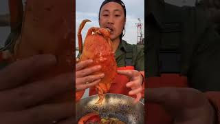 Fishermen's eating delicious seafood (Octopus, king crab, lobster, oyster, shrimp, scallop)