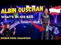 ALBIN OUSCHAN / What’s in the BAG