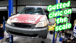 How Much Does A Gutted EK HATCH weigh?