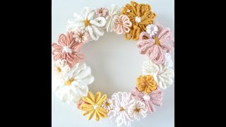 How to Make a Yarn Flower with a Flower or Round Loom