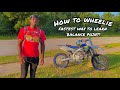 HOW TO WHEELIE A DIRT BIKE TUTORIAL! FASTEST WAY TO LEARN BALANCE POINT (YZ450F) KO9ETV