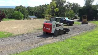 2005 BOBCAT T250 TRACK SKID STEER WITH NEW BUCKET AND CAB