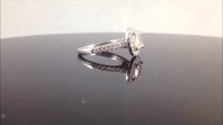 14K white gold engagement ring set with  1ct cushion cut diamond and 30 round side settings.