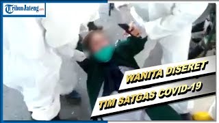 Viral Wanita Diseret Tim Satgas Covid-19 Pertahankan Jenazah Suami