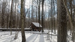 Atmospheric cold winter, overnight in the old log cabin