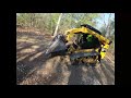 cat 289d skid steer spreading crushed concrete