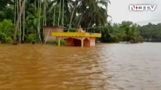 Road Under Water, Residents Of Navunda Village Use Rafting Boat To Reach Home