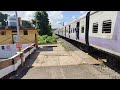 howrah seoraphuli local train just passing through out the rail station.