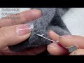 darning a large hole in a sweater