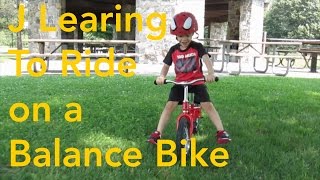 J Riding His Kazam Balance Bicycle