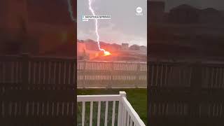 Woman captures lightning strike outside home - ABC News