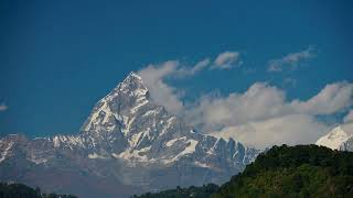 Time lapse over the majestic Machapuchare aka Machhapuchhre or Fishtail peak | Paragliding