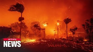 At least five dead as massive wild fires engulf LA County