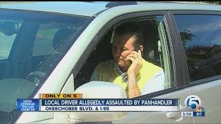 Panhandler attacks car