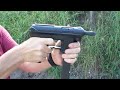 tec 9 with a silencer. yes it s a tec 9 just like it says on the gun.