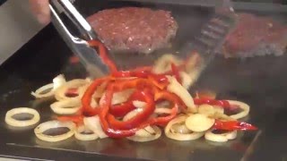 Hamburgers cooked on the Bora Professional Tepanyaki cooktop at 8 Appliances